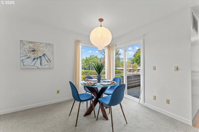 5858 S Riveridge Ln Unit 24, Portland, OR 97239 - dining space with light carpet