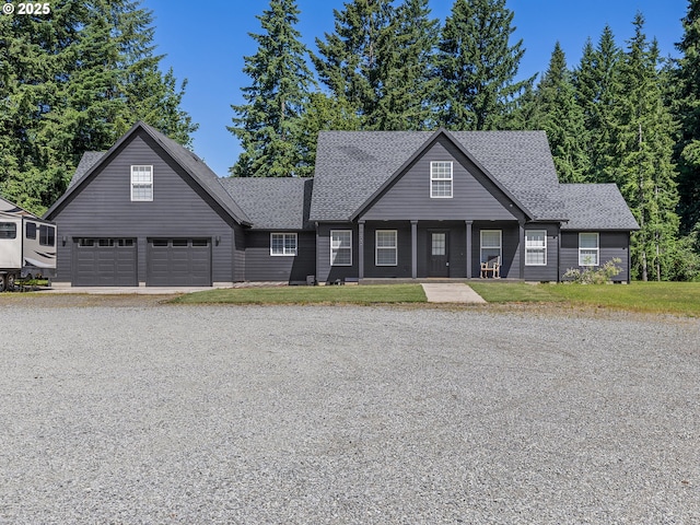 14300 NE Axford Rd, Battle Ground, WA 98604 - view of front facade featuring driveway and a shingled roof