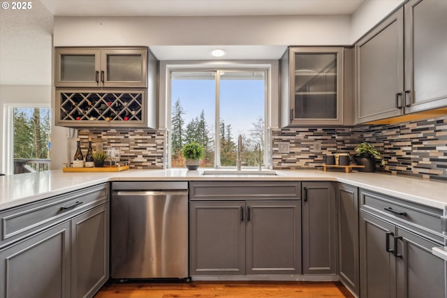 213 Hidalgo St, Lake Oswego, OR 97035 - kitchen featuring dishwasher, a sink, and gray cabinetry