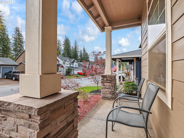 1725 NE Currin Creek Dr, Estacada, OR 97023 - view of patio featuring a porch and a residential view