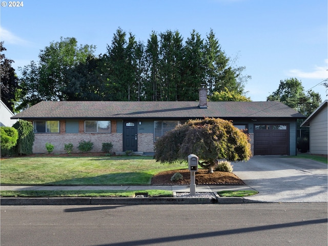 1890 NW 6th Dr, Gresham, OR 97030 - ranch-style home featuring concrete driveway, an attached garage, a front yard, a chimney, and brick siding