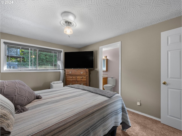 1890 NW 6th Dr, Gresham, OR 97030 - carpeted bedroom featuring connected bathroom and baseboards