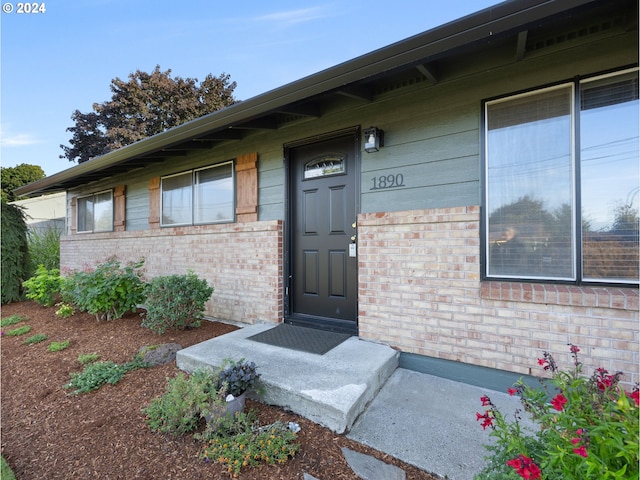 1890 NW 6th Dr, Gresham, OR 97030 - view of exterior entry featuring brick siding