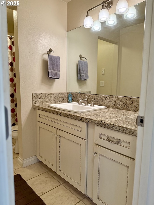 full bath with toilet, tile patterned floors, a shower with shower curtain, and vanity