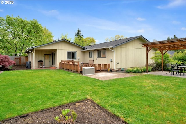 rear view of property with fence, a patio, a lawn, and a pergola