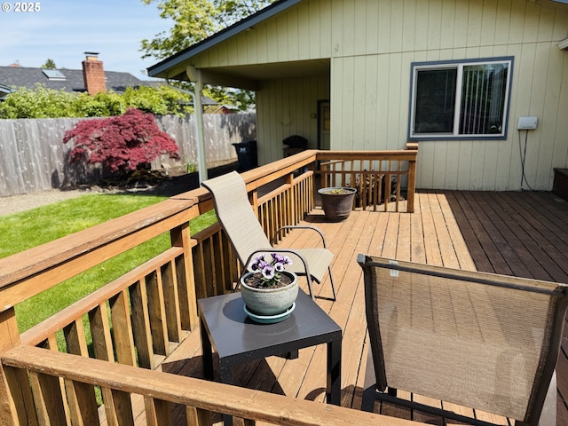 wooden deck featuring fence