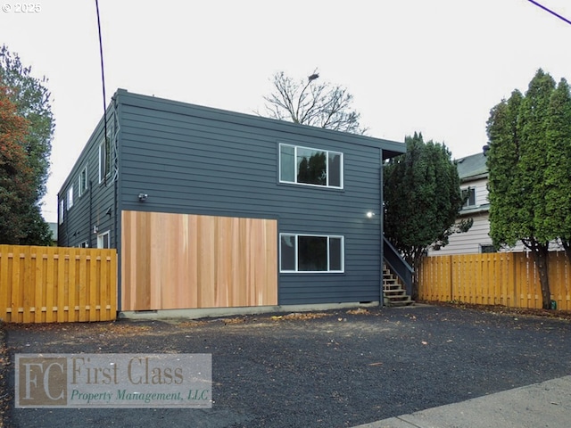 5516 NE Hoyt St, Portland, OR 97213 - view of front facade featuring stairway