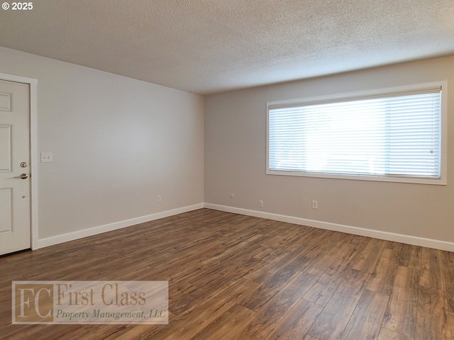 5516 NE Hoyt St, Portland, OR 97213 - spare room featuring wood finished floors and a textured ceiling