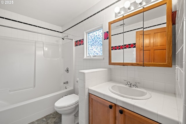 full bathroom with decorative backsplash, vanity, shower / tub combination, tile patterned flooring, and toilet