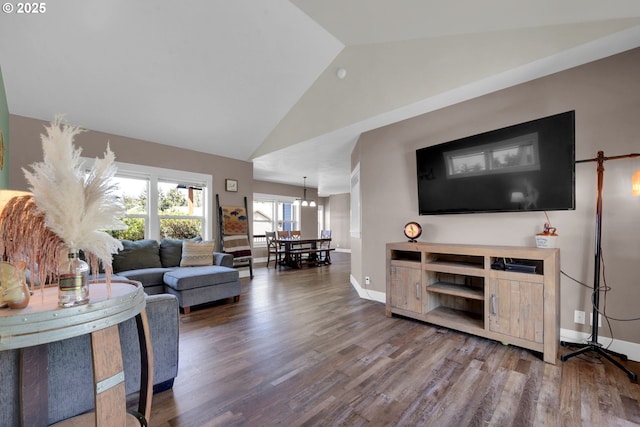 930 Kristen Way, Cottage Grove, OR 97424 - living area featuring wood finished floors, baseboards, and high vaulted ceiling