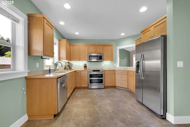 930 Kristen Way, Cottage Grove, OR 97424 - kitchen featuring light brown cabinets, recessed lighting, stainless steel appliances, a sink, and light countertops