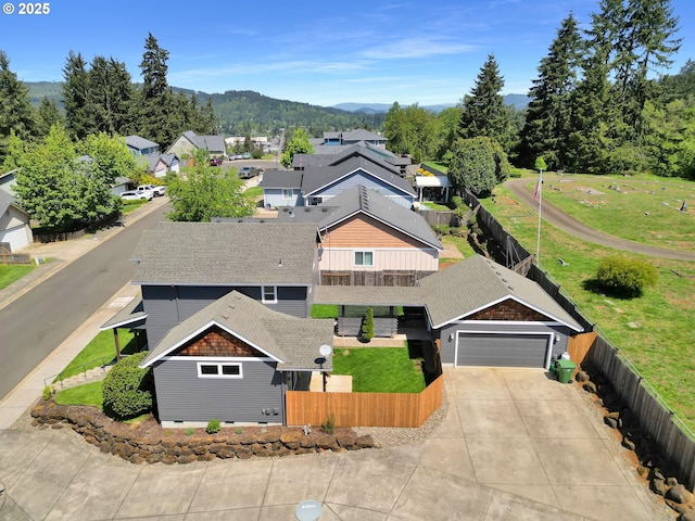 930 Kristen Way, Cottage Grove, OR 97424 - drone / aerial view with a mountain view