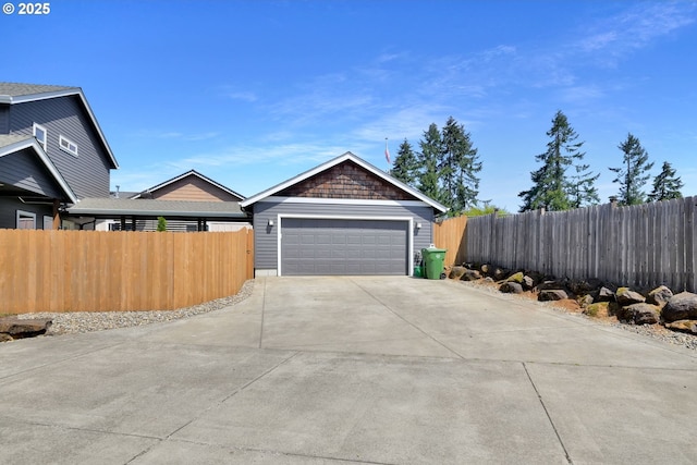 930 Kristen Way, Cottage Grove, OR 97424 - exterior space featuring concrete driveway, fence, and a garage
