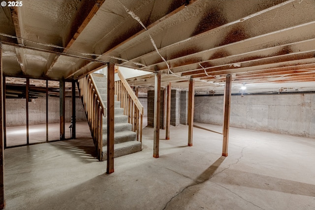 unfinished basement with stairway