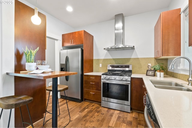 12842 Boones Ferry Rd, Lake Oswego, OR 97035 - kitchen featuring wall chimney exhaust hood, appliances with stainless steel finishes, a sink, dark wood-style floors, and light countertops