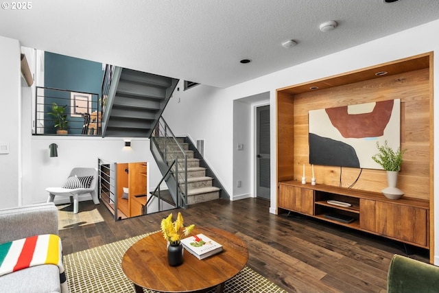5210 SW Hewett Blvd, Portland, OR 97221 - living room with stairway, hardwood / wood-style flooring, and a textured ceiling