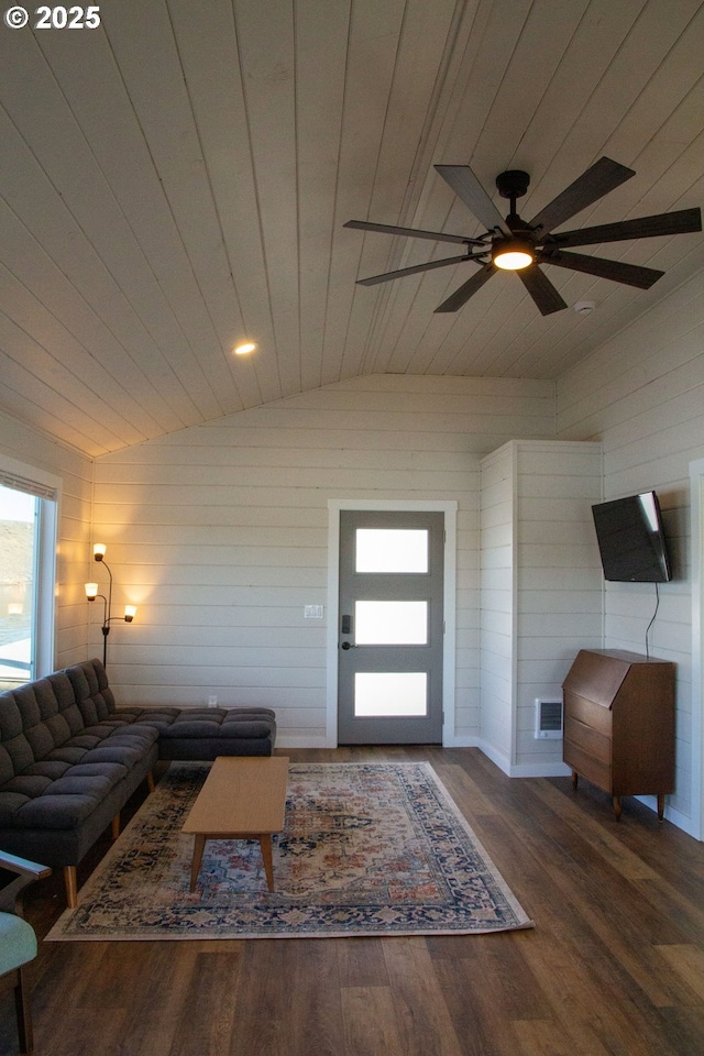 living area with vaulted ceiling, wood ceiling, wood finished floors, and visible vents