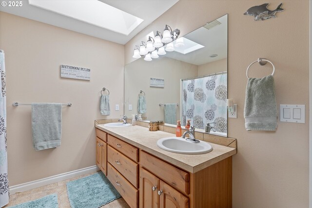 16436 Visionary Ct, Oregon City, OR 97045 - full bath with a skylight, double vanity, and baseboards