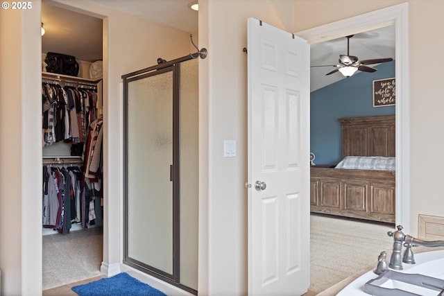 16436 Visionary Ct, Oregon City, OR 97045 - ensuite bathroom featuring a shower stall, a ceiling fan, a spacious closet, and vaulted ceiling