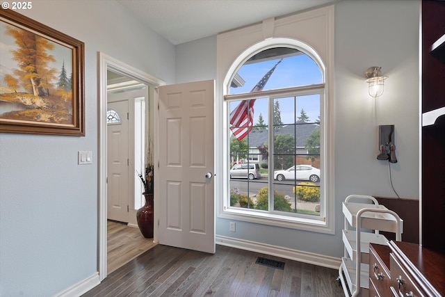 16436 Visionary Ct, Oregon City, OR 97045 - foyer featuring baseboards, healthy amount of natural light, and dark wood finished floors