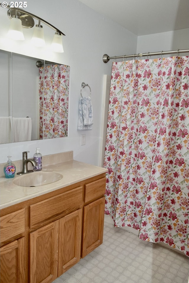 29519 Crook St, Gold Beach, OR 97444 - full bath featuring tile patterned floors, vanity, and curtained shower