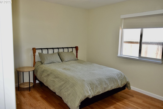 29519 Crook St, Gold Beach, OR 97444 - bedroom featuring wood finished floors and baseboards