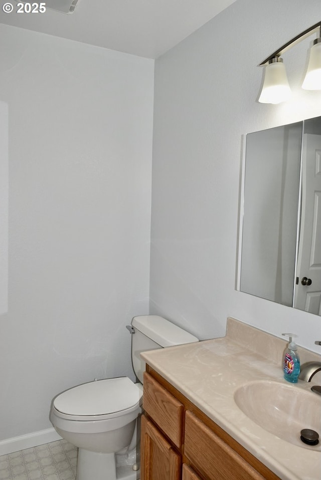 29519 Crook St, Gold Beach, OR 97444 - half bath with vanity, baseboards, and toilet