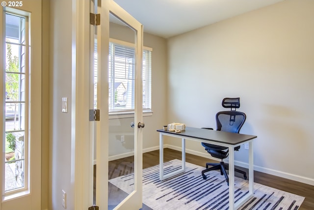 office with baseboards and wood finished floors