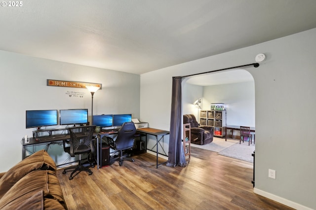 office area with hardwood / wood-style floors