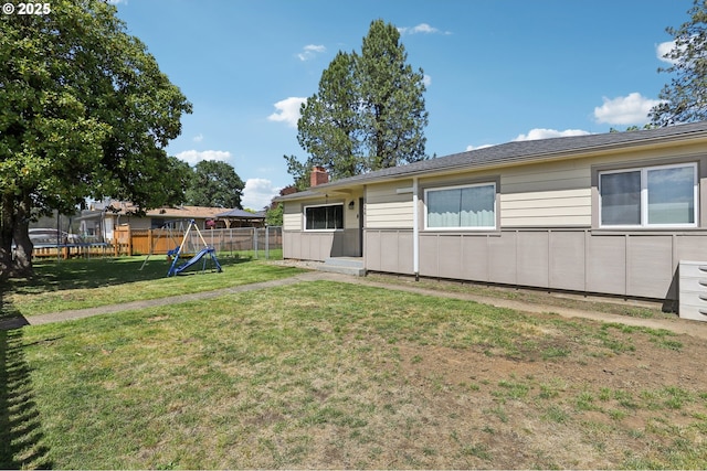 324 N 18th St, Saint Helens, OR 97051 - view of yard with a playground and a trampoline