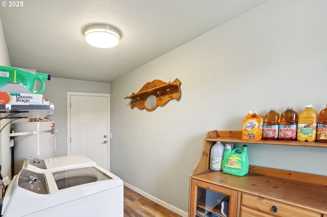 324 N 18th St, Saint Helens, OR 97051 - washroom with separate washer and dryer, wood finished floors, and baseboards