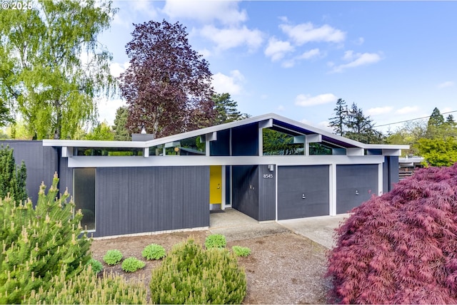 garage featuring driveway
