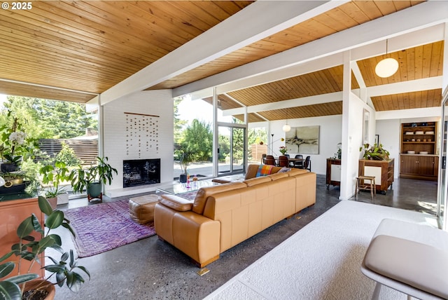 interior space featuring a fireplace, beam ceiling, and wooden ceiling