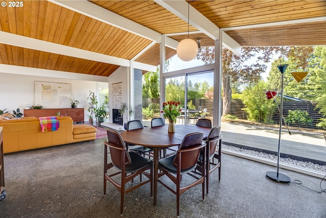 sunroom with beamed ceiling