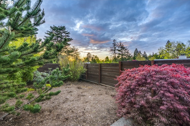 gate at dusk with fence