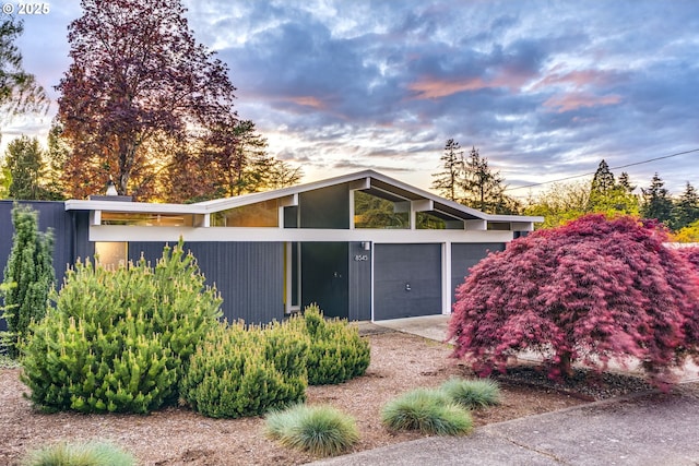 exterior space with an attached garage and driveway