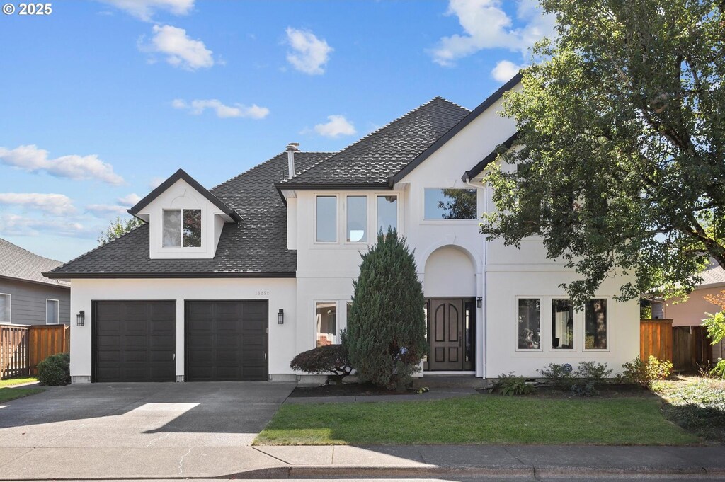 view of front of property with a garage