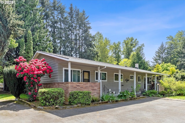 14707 SW Hall Blvd, Tigard, OR 97224 - ranch-style house with covered porch and brick siding