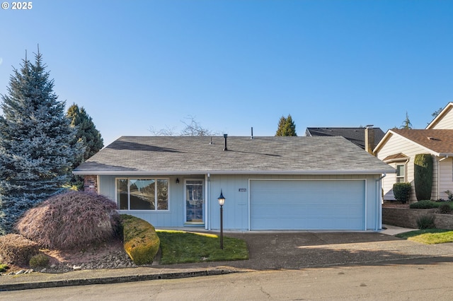 ranch-style home with a garage