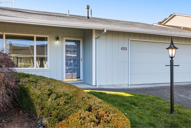 entrance to property with a garage