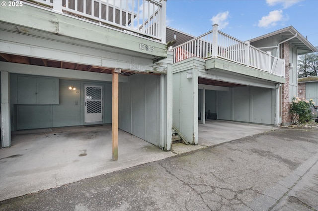 12841 SE Stark St Unit A19, Portland, OR 97233 - back of property featuring a balcony and a carport