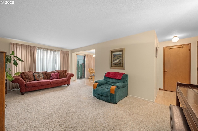 12841 SE Stark St Unit A19, Portland, OR 97233 - living area with light carpet and baseboards
