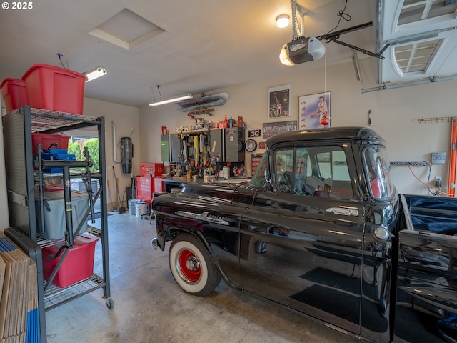 14988 SE Glenbrook Rd, Clackamas, OR 97015 - garage featuring a garage door opener and a central vacuum unit