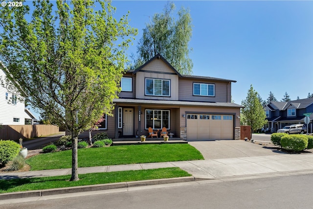 11862 White Ln, Oregon City, OR 97045 - view of front of property with driveway, a porch, an attached garage, and stone siding