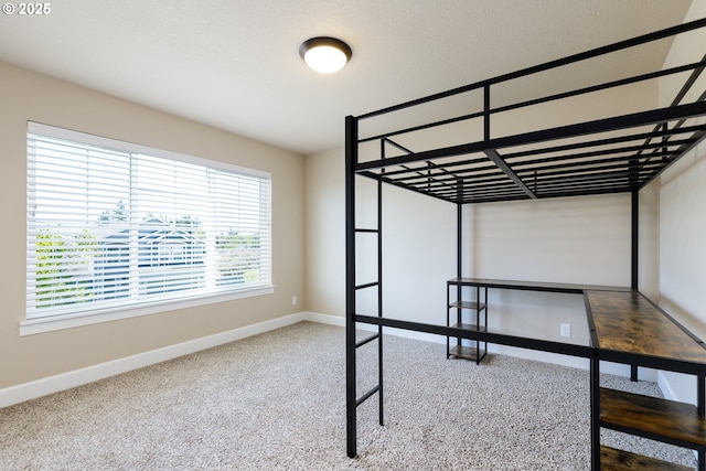11862 White Ln, Oregon City, OR 97045 - unfurnished bedroom featuring baseboards and carpet floors