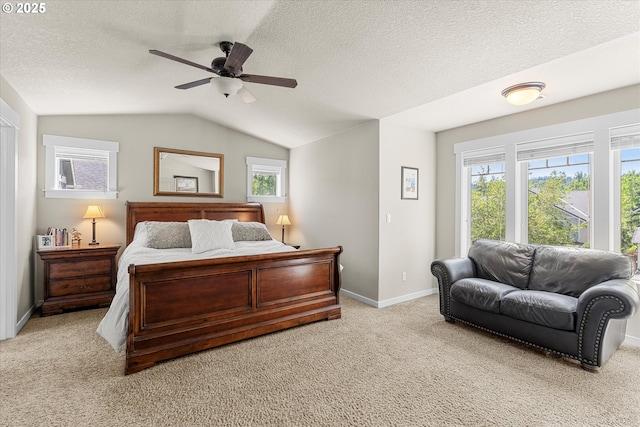 18289 SW Maidenfern Ln, Sherwood, OR 97140 - carpeted bedroom featuring multiple windows, lofted ceiling, a textured ceiling, baseboards, and a ceiling fan