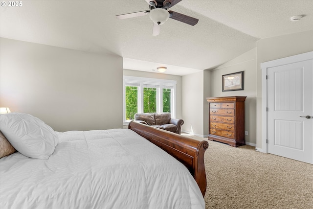18289 SW Maidenfern Ln, Sherwood, OR 97140 - carpeted bedroom featuring vaulted ceiling, a textured ceiling, a ceiling fan, and baseboards