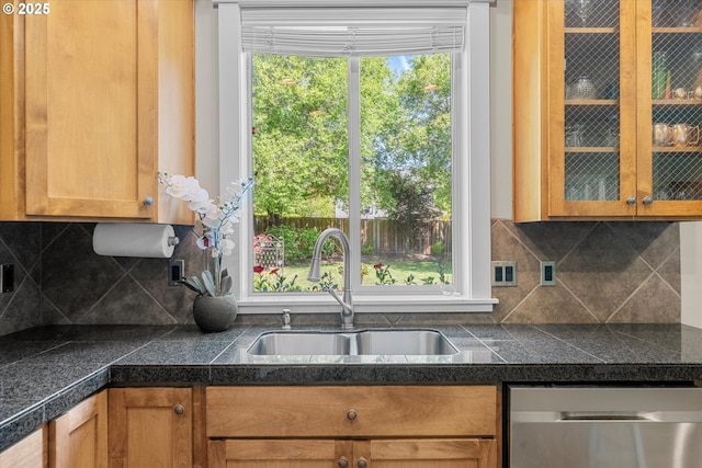 18289 SW Maidenfern Ln, Sherwood, OR 97140 - kitchen with a sink, stainless steel dishwasher, tile countertops, and glass insert cabinets