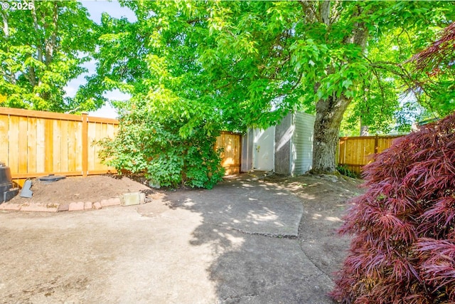 fenced backyard featuring a patio area