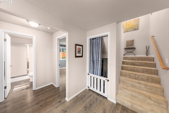 14805 SW 109th Ave, Portland, OR 97224 - corridor with wood finished floors, stairs, and baseboards